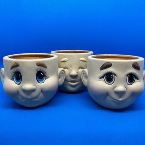 vintage doll head planters